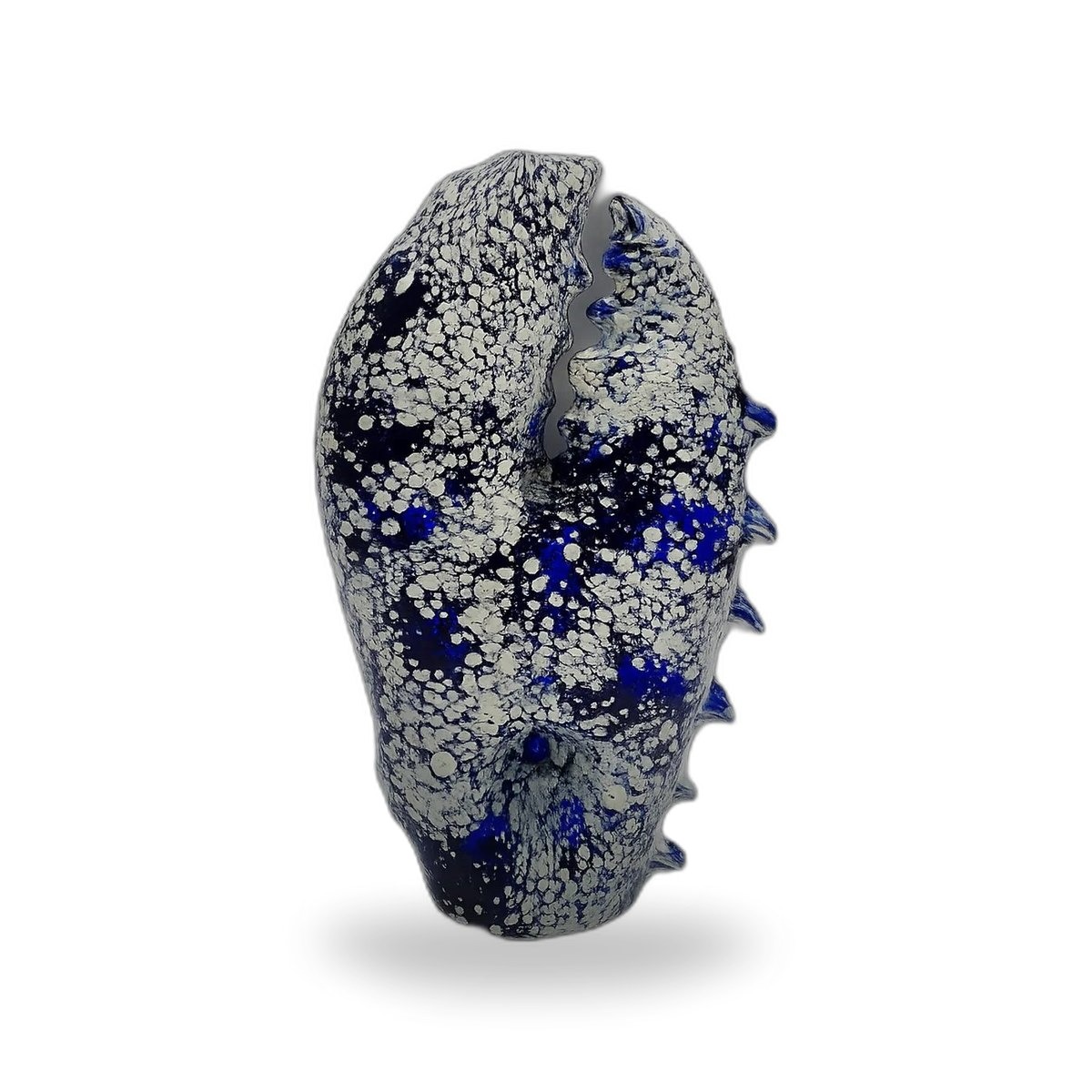 Abyss Claw, a hand-blown sculpted glass hand pipe in cobalt and bone white